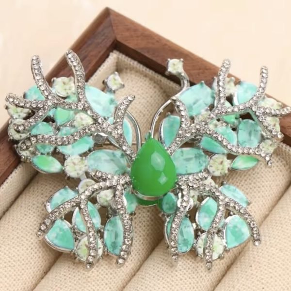 Green butterfly brooch